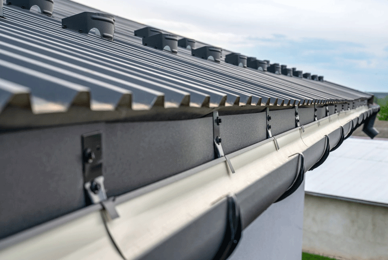 House with vinyl gutters showing pros and cons of vinyl gutters