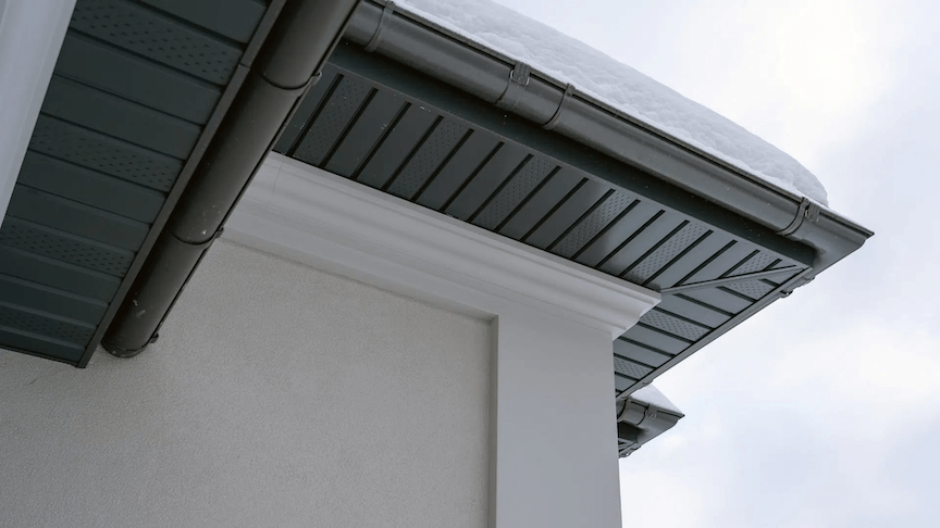 A diagram showing a gutter and fascia board with water dripping in the gap between them